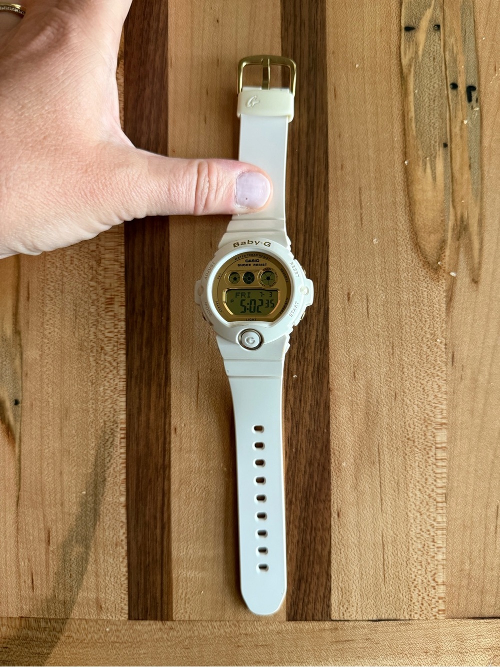 Casio gold and white Baby G watch